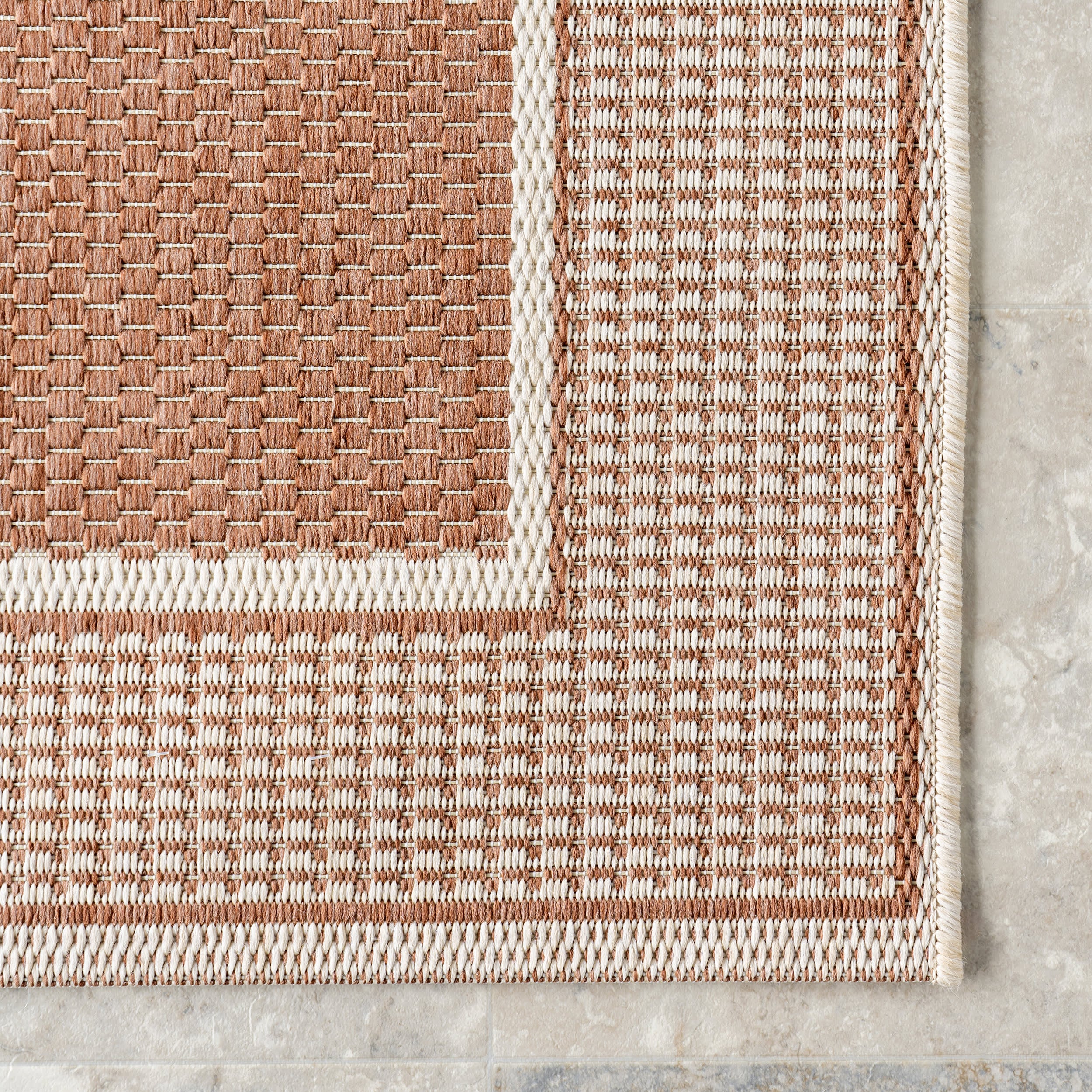 Monochrome Bordered Indoor/Outdoor Rug | Brown