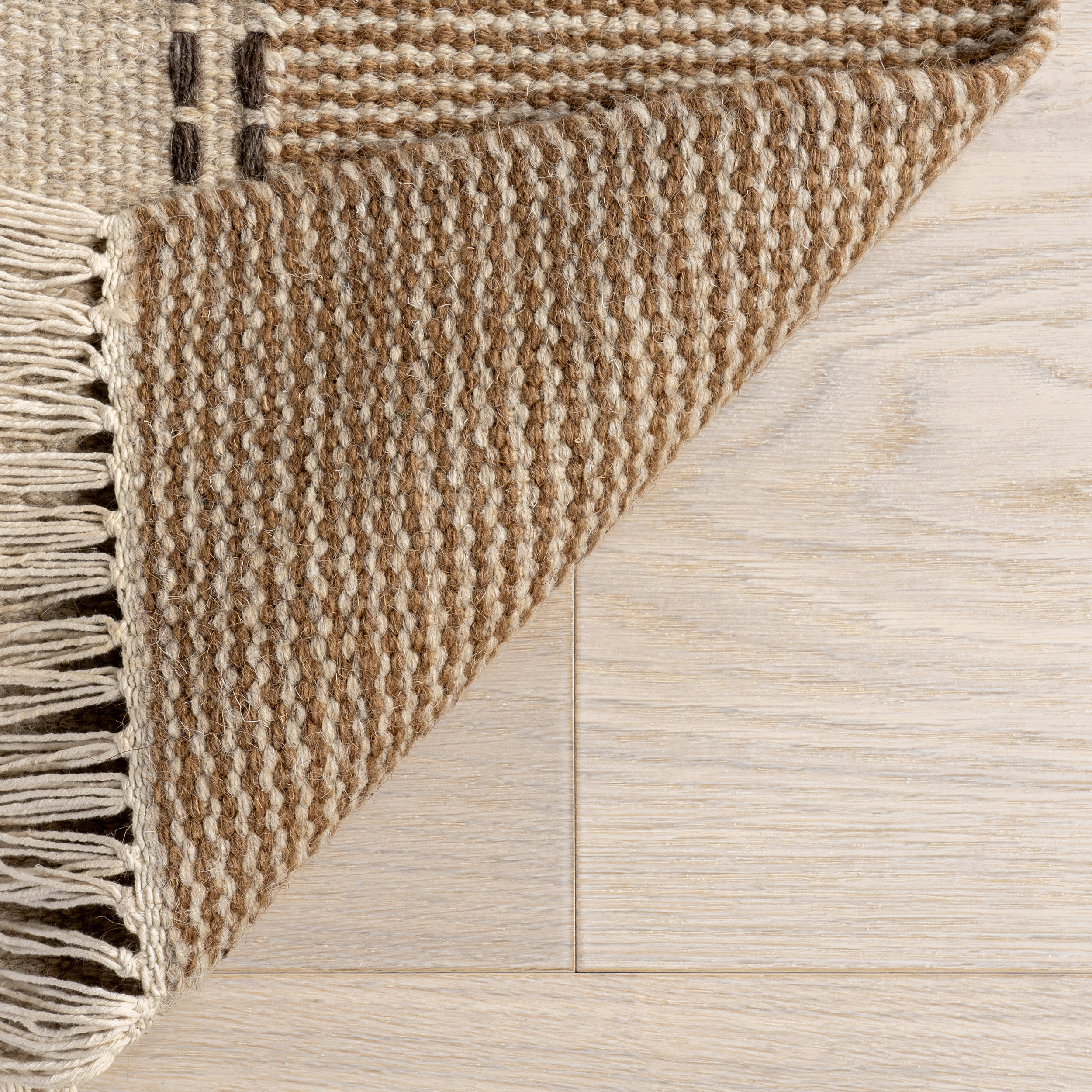 Corbett Fringed Wool Rug | Beige