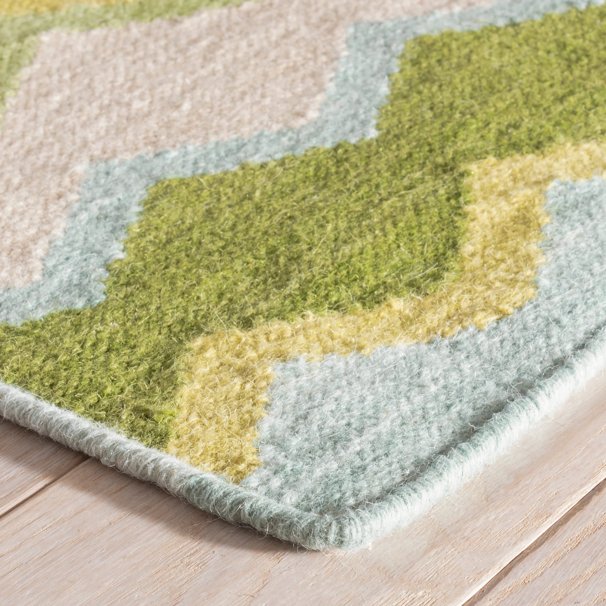 Safety Net Green Handwoven Wool Rug