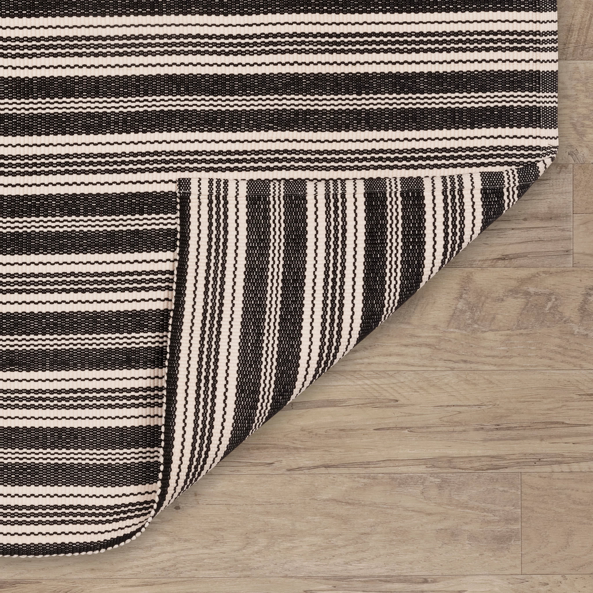 Ticking Stripe Black/Ivory Handwoven Indoor/Outdoor Rug