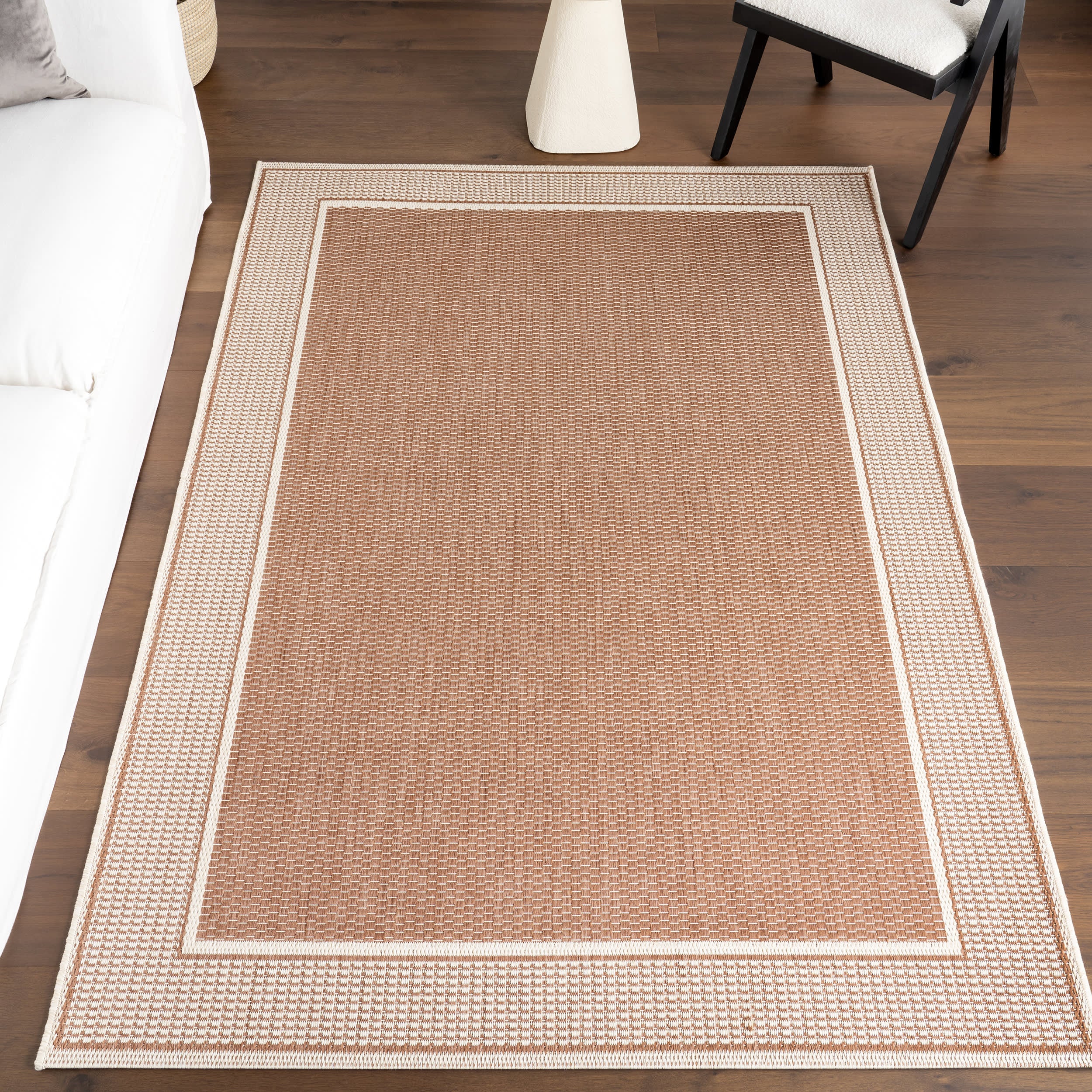 Monochrome Bordered Indoor/Outdoor Rug | Brown