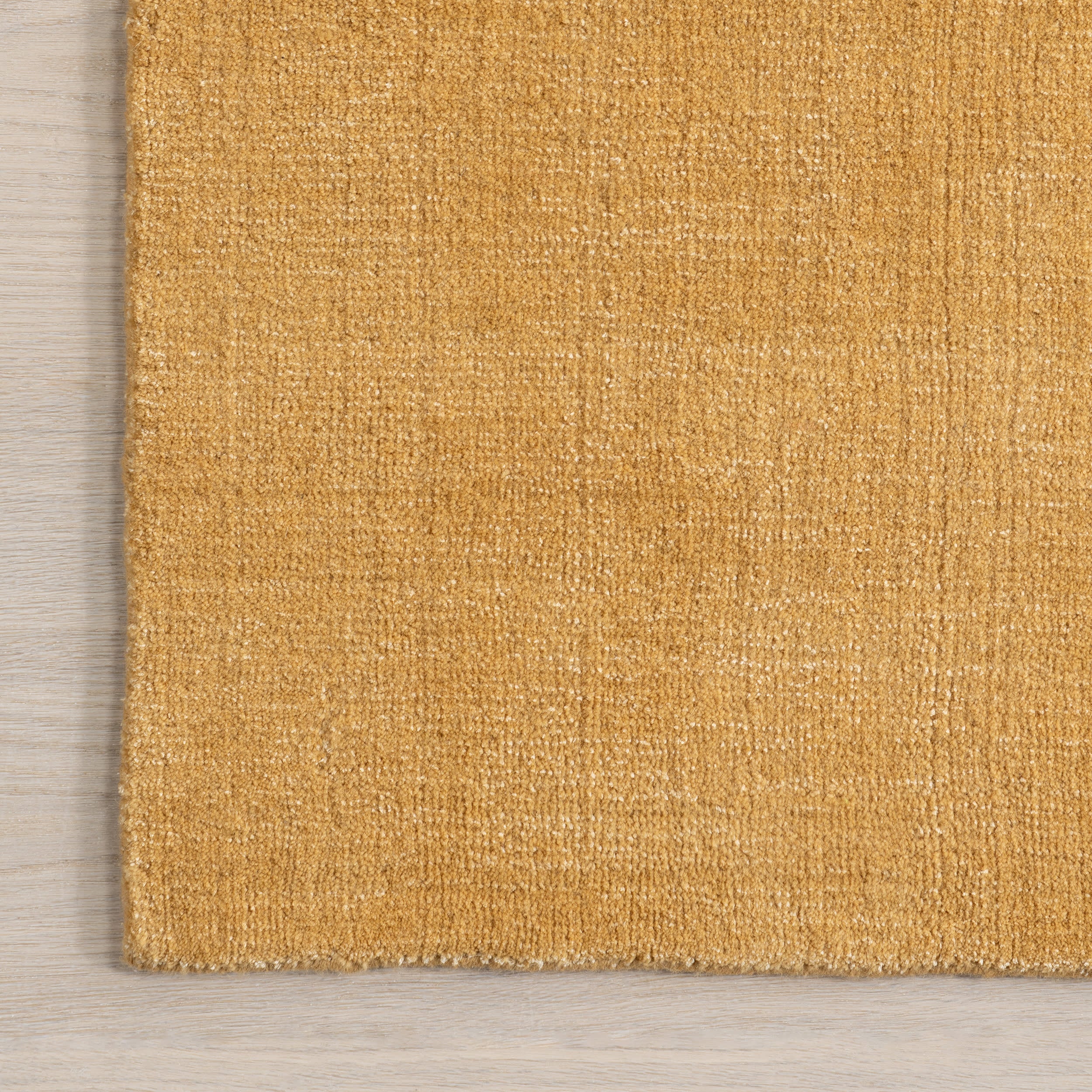 Arrel Speckled Wool-Blend Rug | Golden Butter